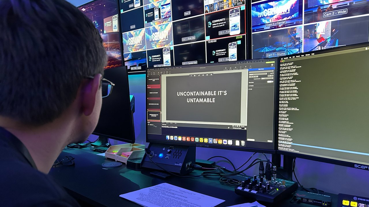 Live worship stage with presentation screens